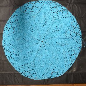 Large, handmade table doily.